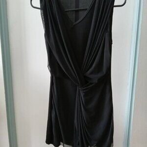 Beautiful black dress with crossover neckline and asymmetrical skirt